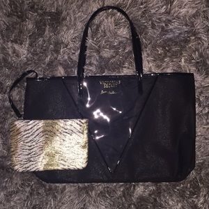 Victoria Secret tote with makeup bag.